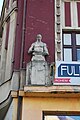 Statue on the building at Masaryk square in Ostrava, Czech republic.