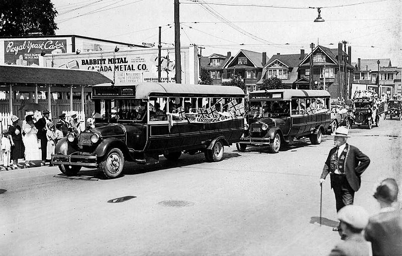 File:T.T.C. motor coaches, in Orange Celebration, Toronto.JPG