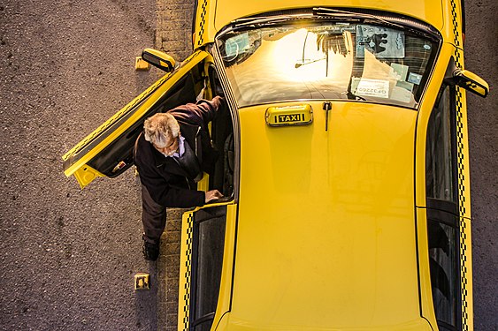 Taxi Driver pull car to the front line to pick up passengers