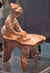 Terracotta statur woman kneading dough 5th century BC 02.jpg