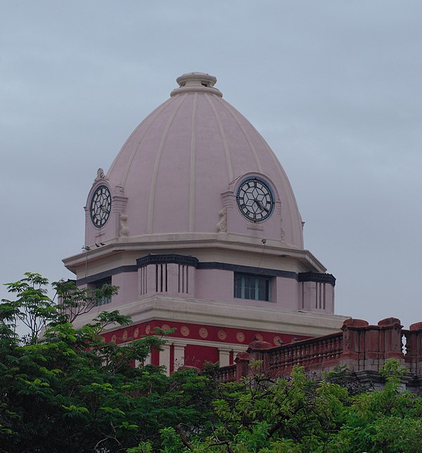The clock tower atop the building