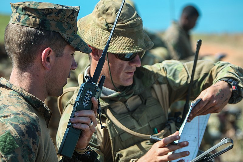 File:U.S. Marine Corps Capt. Brian M. Ellis, left, the air officer for Battalion Landing Team, 2nd Battalion, 4th Marine Regiment, 31st Marine Expeditionary Unit, coordinates with Australian Army Bombardier Corey W 130803-M-PZ610-008.jpg