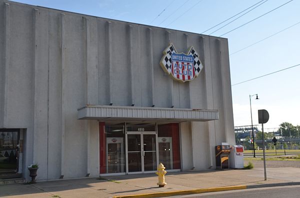 USAC's headquarters on 16th Street in Speedway, Indiana, less than a block from the Indianapolis Motor Speedway (visible behind the headquarters)