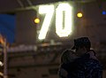US Navy 111130-N-TZ605-147 Aviation Electronics Technician Ariman Christopher Fowler says goodbye to his wife before the Nimitz-class aircraft carr.jpg
