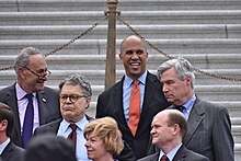 Franken in July 2017 (second from the left) WASHINGTON, DC -- JULY 25 2017 Democratic Senators address a crowd of supporters at a rally on the Capitol steps after the motion to proceed vote on the Trumpcare bill. (35998609362).jpg