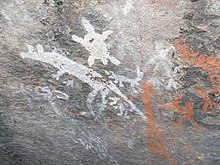 Aboriginal rock painting at Namadgi National Park featuring a kangaroo, dingoes, emus, humans and an echidna or turtle Yankee Hat art-MJC.jpg