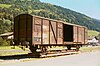 A transporter wagon under a standard-gauge car