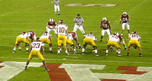 Booty (#10) leading a drive against the Stanford Cardinal. 11-04-06-JohnDavidBooty-atStanford.jpg