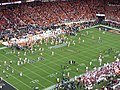 English: Clemson players run onto the field after winning at the 2019 College Football Playoff National Championship.