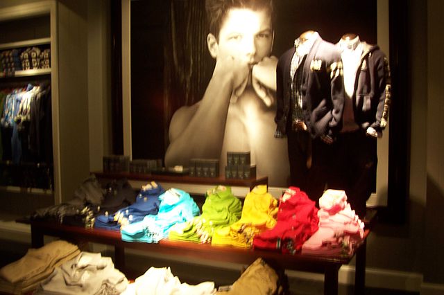 A Weber photograph in the background on display at an Abercrombie and Fitch store