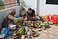 A man and a Brahmin performing Shraddha ceremony in Nepal