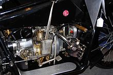 The transmission on this 1921 ABC motorcycle is located behind the engine and shifts by a long hand-operated lever on its right side. Abc-engine.jpg