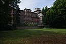 St. Josefs Hospital with main building, chapel and extensions, morgue, entrance gate with enclosure wall and two hospital buildings on Zimmerstrasse