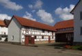 English: Half-timbered building in Heidelbach Am neuen Weg 12, Alsfeld, Hesse, Germany This is a picture of the Hessian Kulturdenkmal (cultural monument) with the ID 12509 (Wikidata)