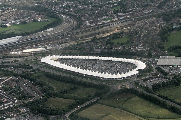 Aerial of Ashford Designer Outlet and borough