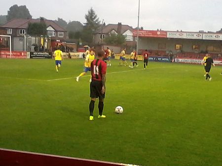 Ashley Vincent, English footballer born 1985, playing for Shrewsbury Town in a practice match at Moss Lane, Altrincham. 1 August 2014.jpg