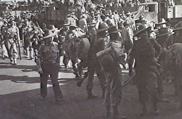 Troops from the 2/43rd Battalion embark at Cairns, 8 August 1943, bound for New Guinea