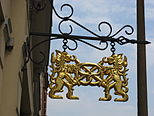 The pretzel has been in use as an emblem of bakers, here with two lions, in Görlitz, Germany.