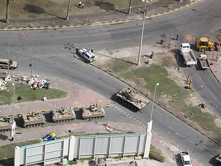 Bahrain army tanks moving in Pearl Roundabout.jpg