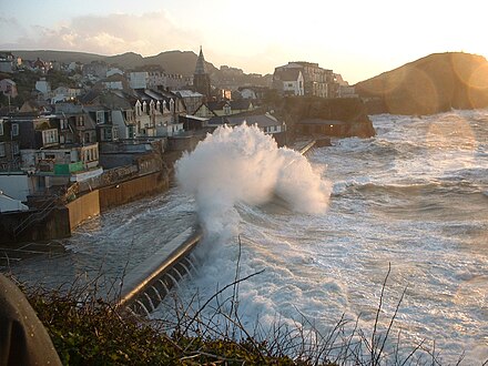 Wave attack on Ilfracombe's sea walls during a storm.