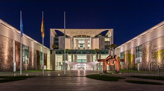 Night view of the front of the German Chancellery building (in German Bundeskanzleramt), located in the heart of Berlin, Germany.