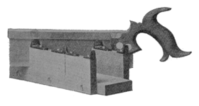 Cc&j-fig17--mitre box with dovetail saw.png