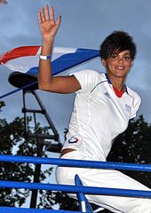 Coralie Balmy, freestyle swimmer, at the parade of French medallists of the 2012 Olympics (August 2012).