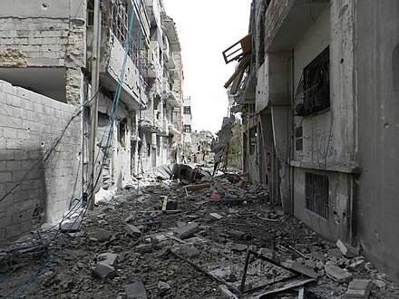Улица разрушенного города. Хомс Сирия 2012. Город Хомс Сирия. Разрушенный Хомс Сирия.