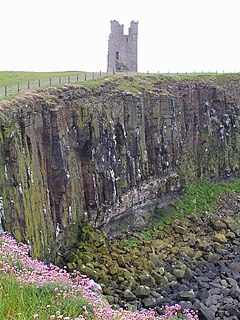 The Gull Crag cliffs and Lilburn Tower Dunstanburgh Castle and Whin Sill - geograph.org.uk - 109789.jpg