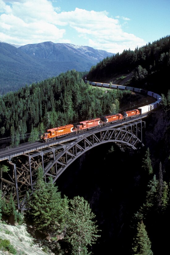An eastbound CPR freight train at Stoney Creek Bridge descending from Rogers Pass