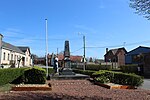 Poilu au repos (monument aux morts)[3]