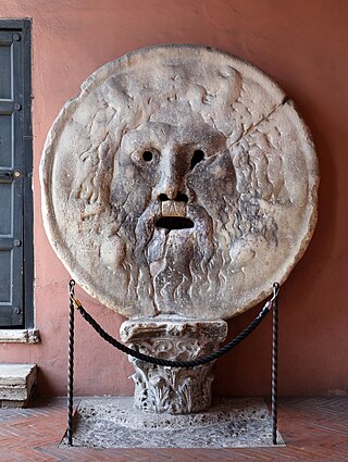 <span title="Italian-language text"><i lang="it">Bocca della Verità</i></span> Marble mask in Rome, Italy