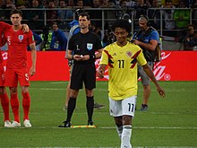 Cuadrado si avvia a battere il proprio tiro di rigore nella sfida contro l'Inghilterra al mondiale 2018