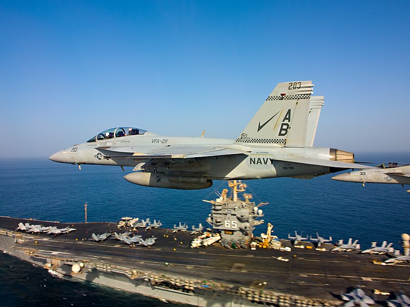 File:Flickr - Official U.S. Navy Imagery - Two F-A-18s fly over USS Enterprise. (1).jpg
