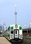 GO Transit cab control car with the CN Tower in the background