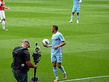 Clichy taking a throw-in for Manchester City in April 2012, against former club Arsenal.