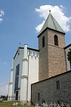 Gethsemani Abbey church and bell tower.jpg
