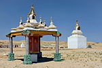 Prayer wheel and stupas. Khamar Monastery. Gobi Desert, Dornogovi Province, Mongolia.