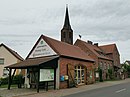 Village school with stable and farm buildings