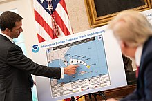 President Trump receives an update on Hurricane Dorian on August 29, 2019. Hurricane Dorian Briefing (48648405897).jpg