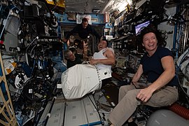 ISS-65 Astronauts share a light moment.jpg