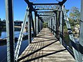 English: Northern Canal Walkway footbridge in front of the Boott dam