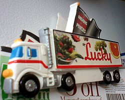 An original Lucky refrigerator magnet bearing its trademark "Lucky means low prices" slogan Lucky refrigerator magnet.JPG