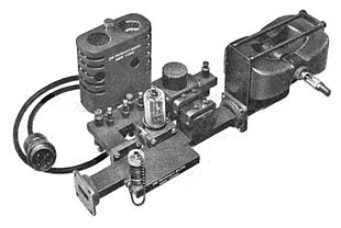 9.375 GHz 20 kW (peak) magnetron assembly for an early commercial airport radar in 1947. In addition to the magnetron (right), it contains a TR (transmit/receive) switch tube and the superheterodyne receiver front end, a 2K25 reflex klystron tube local oscillator and a 1N21 germanium diode mixer. The waveguide aperture (left) would be connected to a waveguide going to the antenna. Magnetron radar assembly 1947.jpg