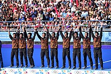 Malaysian team celebrating its Boys' Field Hockey event win. Men's Hockey5s Medallist Ceremony YOG18 14-10-2018 (25).jpg