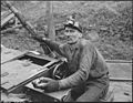 Motorman. P V & K Coal Company, Clover Gap Mine, Lejunior, Harlan County, Kentucky. - NARA - 541292.jpg