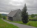 Farmhouse with integrated barn