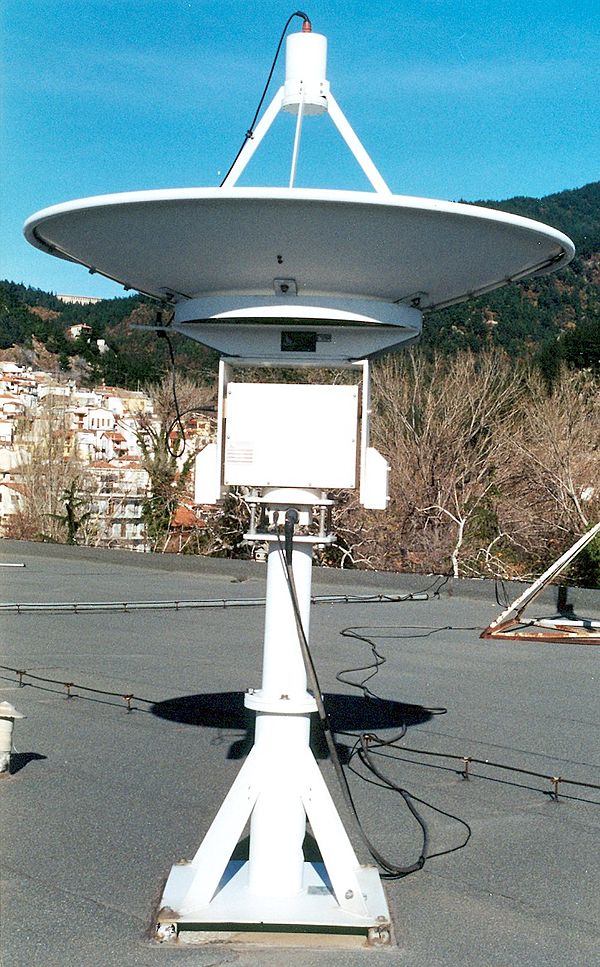 Computer-controlled motorized parabolic dish antenna for tracking LEO weather satellites.