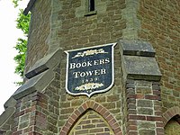 Plaquette op de Booker's Tower, 2012.