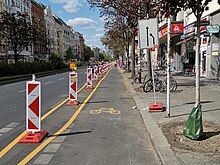 Light segregation on a cycle lane in Berlin Pop-up bike lane Kottbusser Damm Berlin.jpg